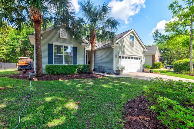 1231 Wild Olive Dr, Mount Pleasant, SC 29464 - view of front of house featuring driveway, a front lawn, and an attached garage