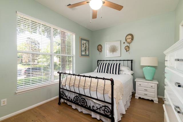 1231 Wild Olive Dr, Mount Pleasant, SC 29464 - bedroom featuring baseboards, wood finished floors, and a ceiling fan