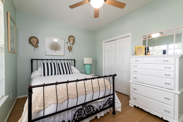 1231 Wild Olive Dr, Mount Pleasant, SC 29464 - bedroom with a closet, wood finished floors, and ceiling fan