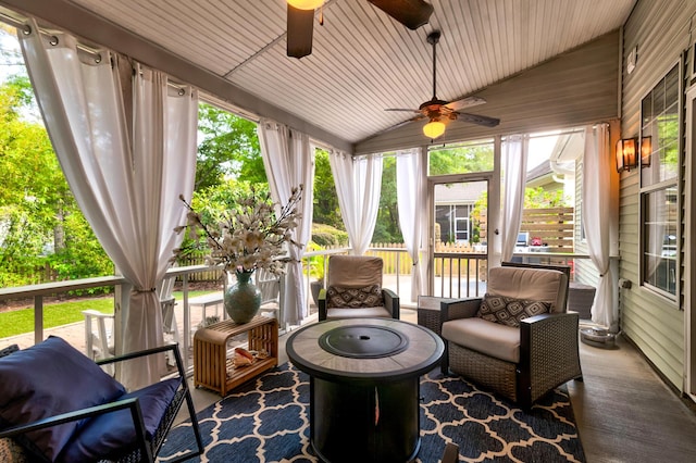 1231 Wild Olive Dr, Mount Pleasant, SC 29464 - sunroom / solarium with ceiling fan, lofted ceiling, plenty of natural light, and an outdoor fire pit