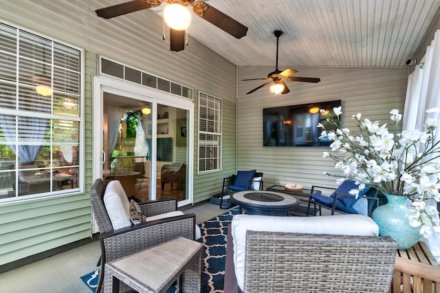 1231 Wild Olive Dr, Mount Pleasant, SC 29464 - sunroom / solarium with a ceiling fan and an outdoor living space with a fire pit