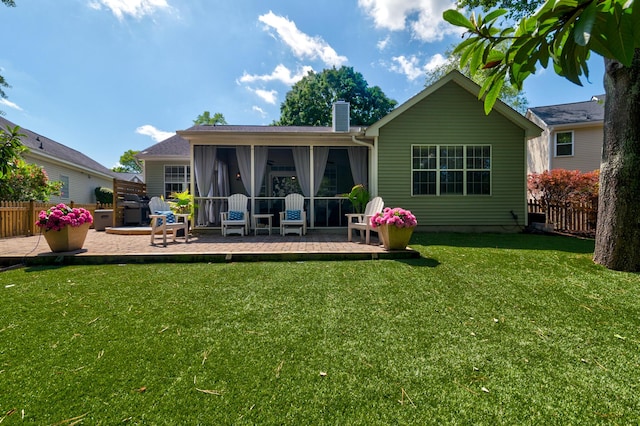 1231 Wild Olive Dr, Mount Pleasant, SC 29464 - back of property with a sunroom and a chimney