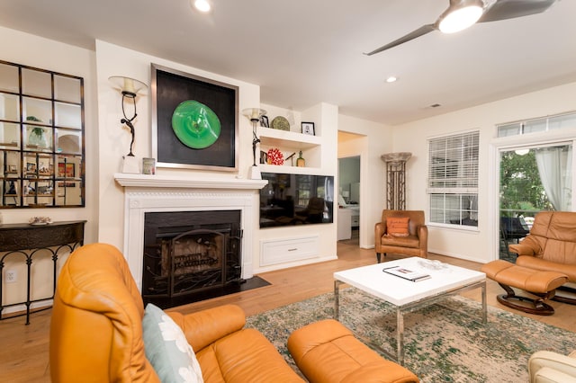 1231 Wild Olive Dr, Mount Pleasant, SC 29464 - living room with ceiling fan, wood finished floors, recessed lighting, and a fireplace with flush hearth