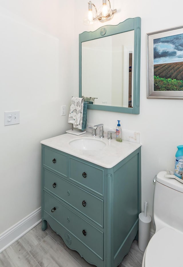 2226 Folly Rd, Charleston, SC 29412 - bathroom with vanity and a chandelier