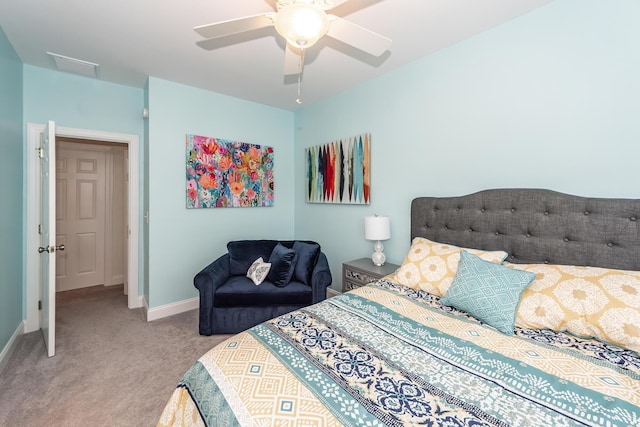 2226 Folly Rd, Charleston, SC 29412 - carpeted bedroom with baseboards and ceiling fan