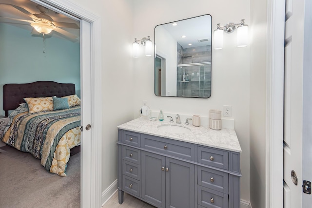 2226 Folly Rd, Charleston, SC 29412 - full bath with ensuite bath, a tile shower, vanity, ceiling fan, and recessed lighting