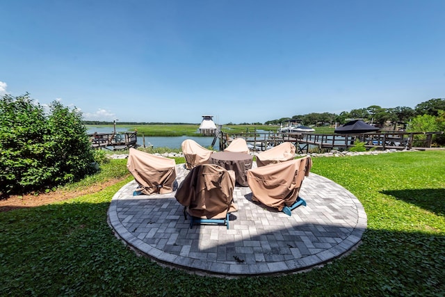 2226 Folly Rd, Charleston, SC 29412 - view of green lawn featuring a gazebo, a water view, and a patio
