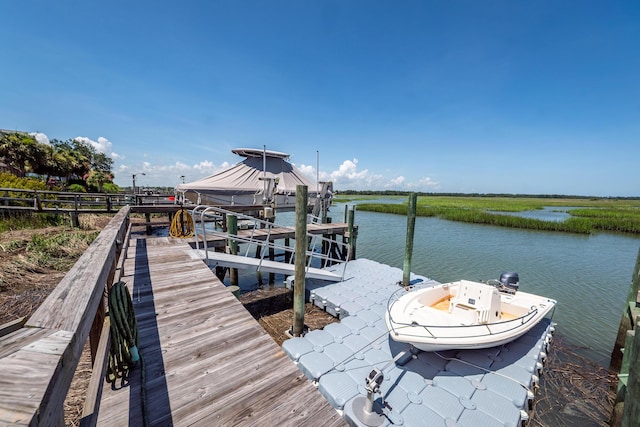 2226 Folly Rd, Charleston, SC 29412 - dock area featuring boat lift and a water view