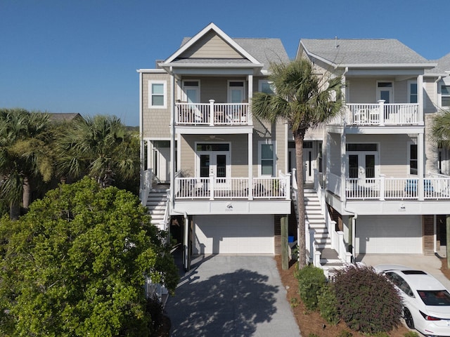 2226 Folly Rd, Charleston, SC 29412 - view of front of house with french doors, stairs, and driveway