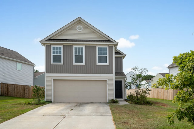 front of property featuring a garage and a front yard