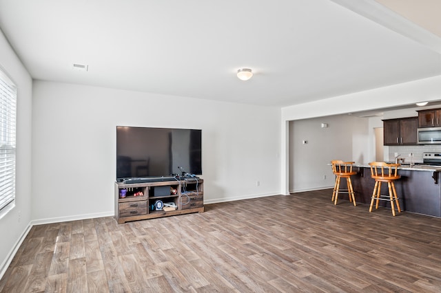 living room with hardwood / wood-style flooring