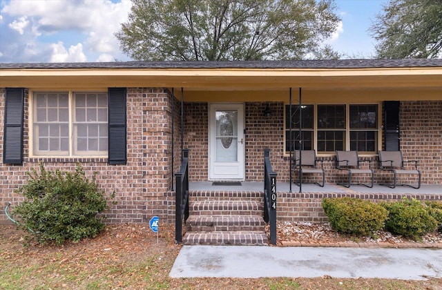 entrance to property with covered porch