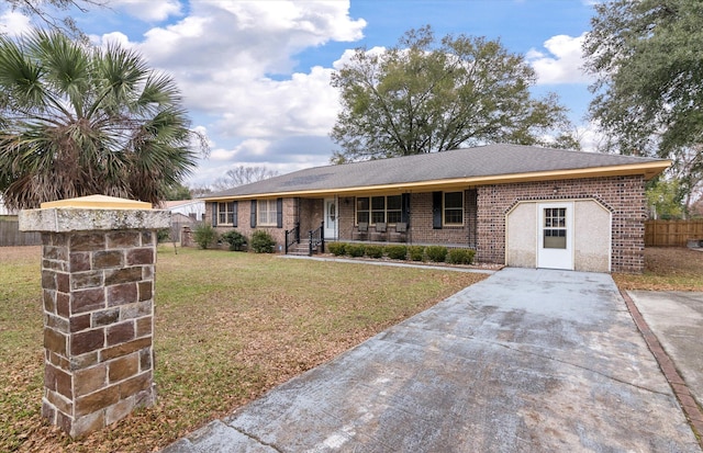 ranch-style home with a front yard