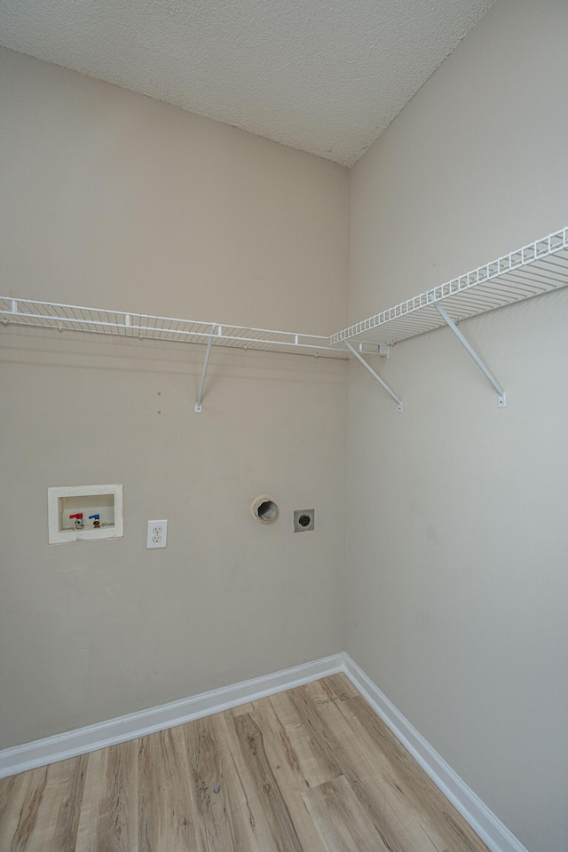 45 Scyamore Ave Unit 623, Charleston, SC 29407 - laundry area with electric dryer hookup, washer hookup, and light wood-style flooring