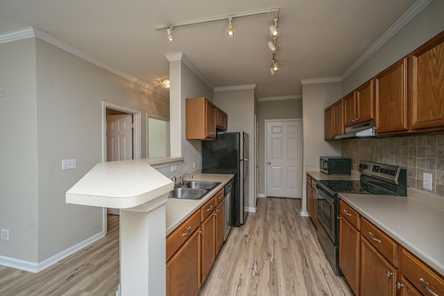 45 Scyamore Ave Unit 623, Charleston, SC 29407 - kitchen with stainless steel appliances, under cabinet range hood, light wood-style floors, and decorative backsplash