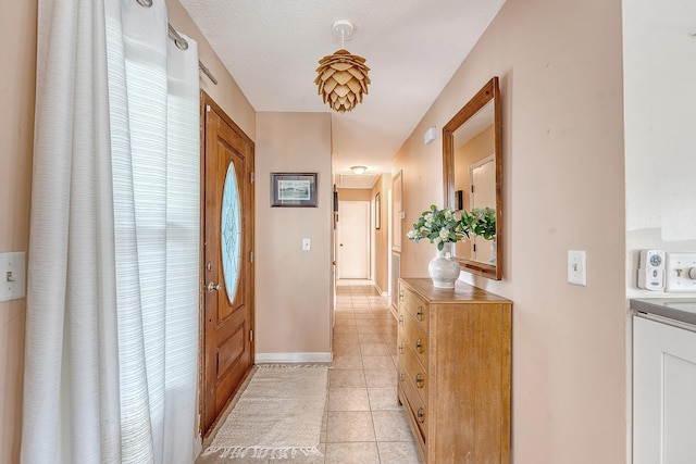 4636 Ashley View Ln, North Charleston, SC 29405 - foyer entrance featuring light tile patterned floors and baseboards