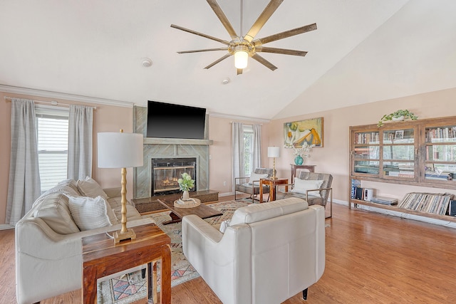 4636 Ashley View Ln, North Charleston, SC 29405 - living area featuring a ceiling fan, a fireplace, light wood-type flooring, and high vaulted ceiling