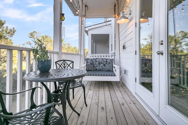 balcony featuring french doors