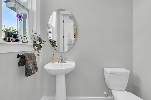 bathroom with sink and toilet