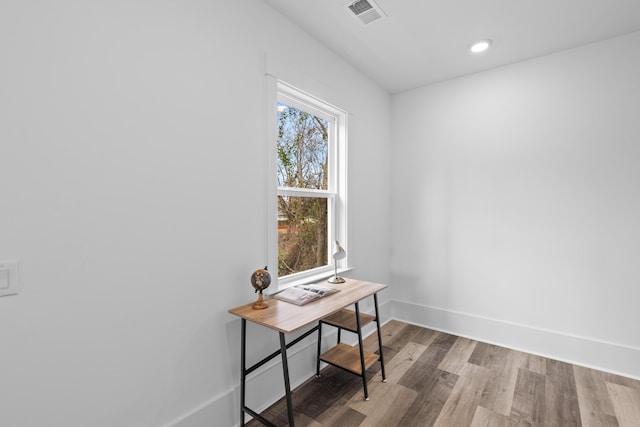 home office with recessed lighting, visible vents, baseboards, and wood finished floors