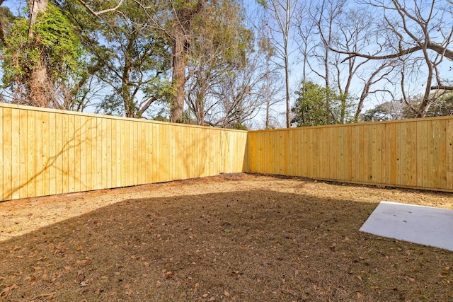 view of yard featuring a fenced backyard