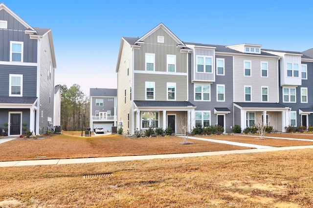 view of property featuring a front yard