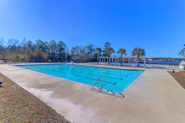 view of pool featuring a patio area