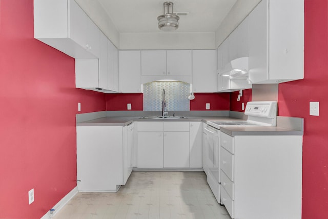 kitchen with white cabinetry, white range, exhaust hood, and sink