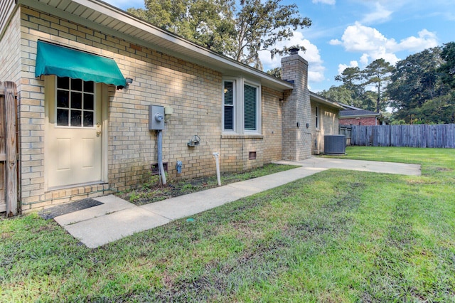 view of home's exterior featuring a yard