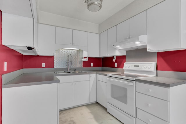 kitchen with white cabinets, sink, and white electric range oven