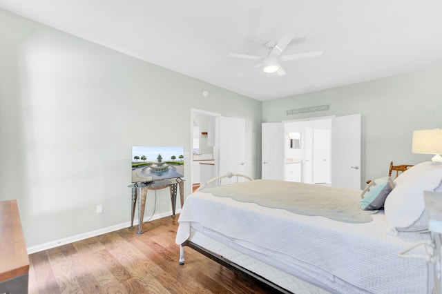 5406 Dwight Dr, North Charleston, SC 29420 - bedroom with wood finished floors, ensuite bath, and ceiling fan