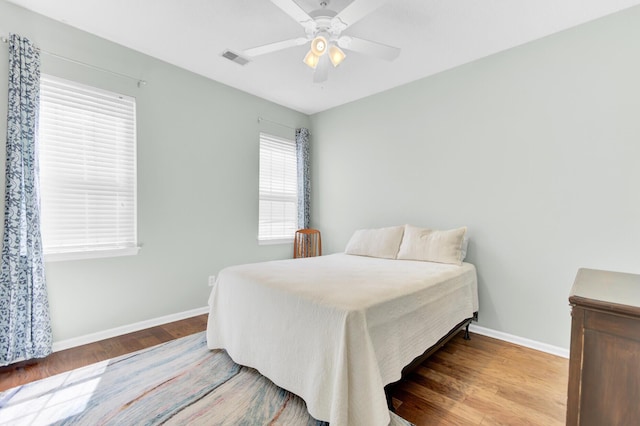 5406 Dwight Dr, North Charleston, SC 29420 - bedroom with wood finished floors and ceiling fan