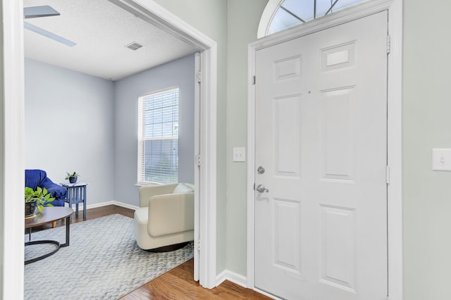 5406 Dwight Dr, North Charleston, SC 29420 - entrance foyer with baseboards and wood finished floors