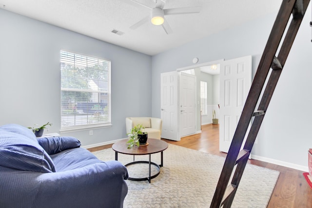 5406 Dwight Dr, North Charleston, SC 29420 - living area featuring wood finished floors and ceiling fan