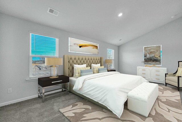 bedroom with vaulted ceiling, carpet, visible vents, and baseboards