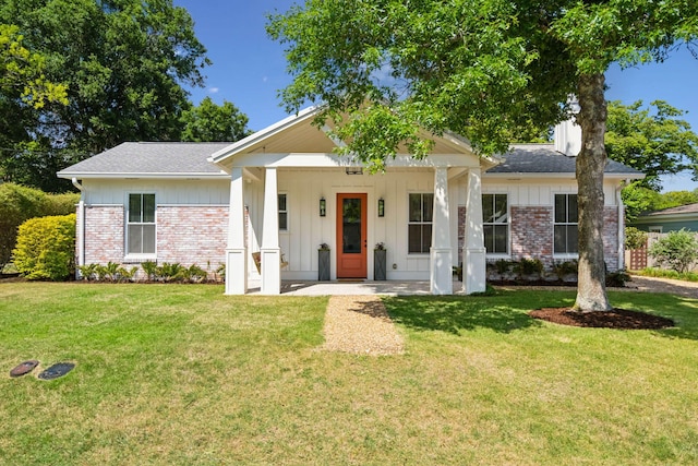 1474 Indian St, Mount Pleasant, SC 29464 - view of front of home featuring a front yard and brick siding