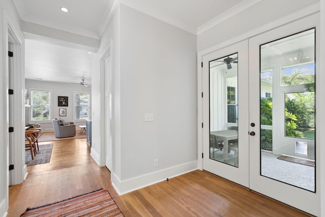1474 Indian St, Mount Pleasant, SC 29464 - doorway featuring a ceiling fan, light wood-style flooring, ornamental molding, baseboards, and recessed lighting