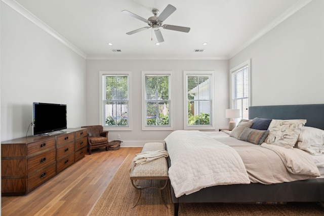 1474 Indian St, Mount Pleasant, SC 29464 - bedroom with multiple windows, light wood-style flooring, crown molding, recessed lighting, and ceiling fan