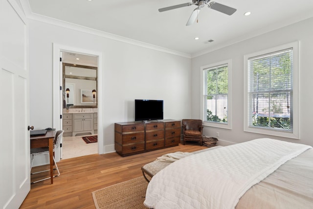 1474 Indian St, Mount Pleasant, SC 29464 - bedroom featuring light wood-style floors, crown molding, recessed lighting, ensuite bath, and a ceiling fan