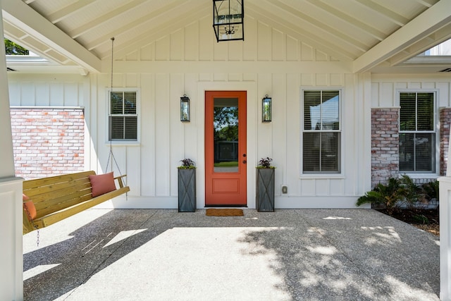 1474 Indian St, Mount Pleasant, SC 29464 - doorway to property featuring board and batten siding
