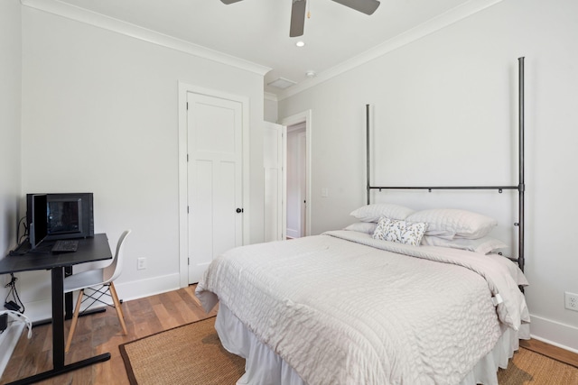 1474 Indian St, Mount Pleasant, SC 29464 - bedroom featuring wood finished floors, ornamental molding, baseboards, an office area, and ceiling fan