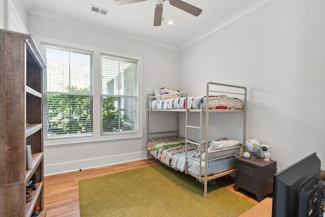 1474 Indian St, Mount Pleasant, SC 29464 - bedroom featuring ornamental molding, wood finished floors, baseboards, ceiling fan, and recessed lighting