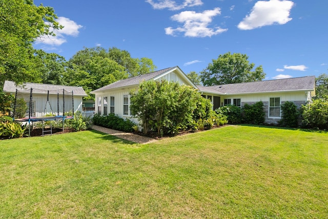 1474 Indian St, Mount Pleasant, SC 29464 - view of front facade featuring a trampoline and a front yard