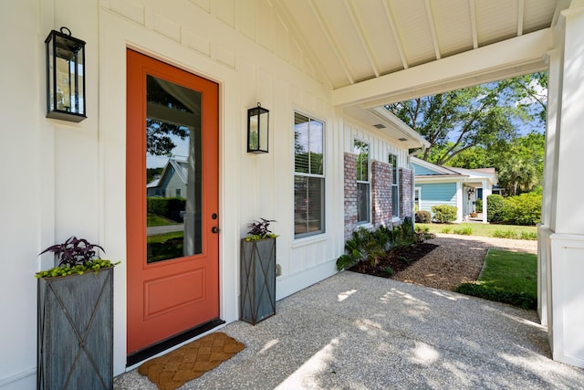 1474 Indian St, Mount Pleasant, SC 29464 - doorway to property featuring board and batten siding