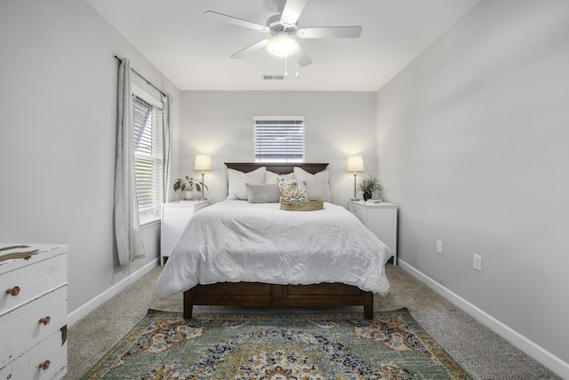 carpeted bedroom featuring ceiling fan