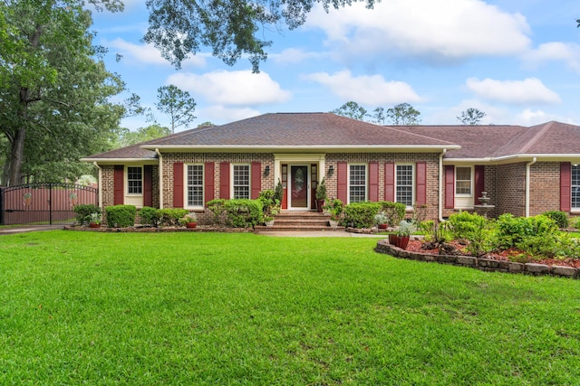 1551 Hutton Pl, Charleston, SC 29407 - ranch-style home featuring brick siding, a gate, a front lawn, and roof with shingles