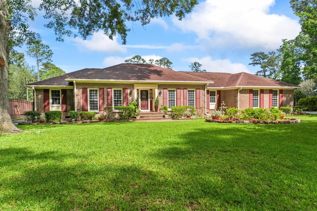 1551 Hutton Pl, Charleston, SC 29407 - ranch-style house featuring brick siding, a front lawn, and roof with shingles