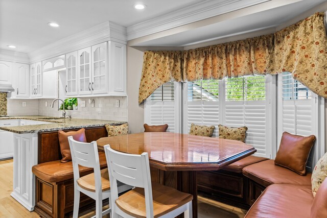 1551 Hutton Pl, Charleston, SC 29407 - dining space featuring recessed lighting, light wood finished floors, and crown molding
