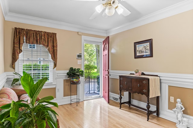 1551 Hutton Pl, Charleston, SC 29407 - foyer featuring wood finished floors, crown molding, ceiling fan, and wainscoting