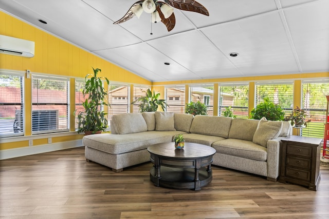 1551 Hutton Pl, Charleston, SC 29407 - living room featuring a wall unit AC, lofted ceiling, ceiling fan, wood finished floors, and wooden walls